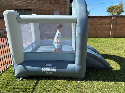 Children jumping inside Arch-O-Rama outdoor jumping castle